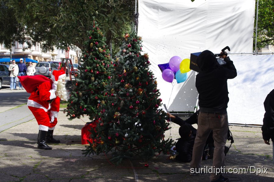 IMGP0079.JPG - Ranbir in a Santa suit, ready to jump out from behind the tree :o)